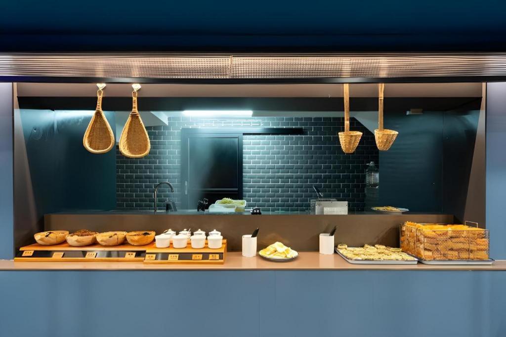 Hanting Hotel Guangzhou Tianhe Экстерьер фото