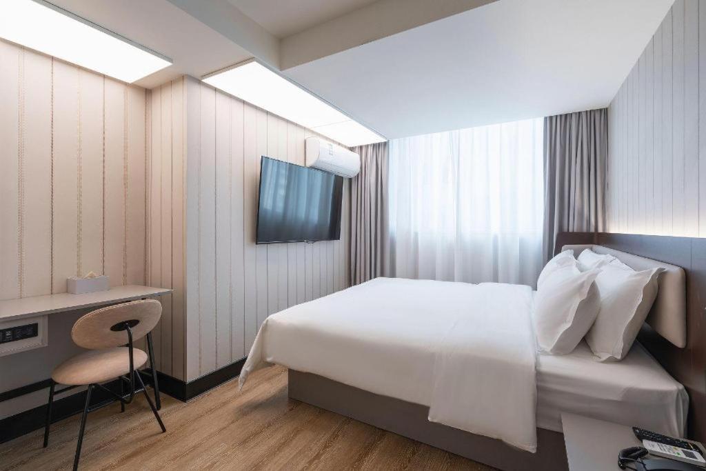 Hanting Hotel Guangzhou Tianhe Экстерьер фото