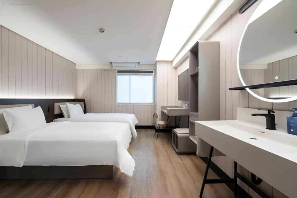 Hanting Hotel Guangzhou Tianhe Экстерьер фото
